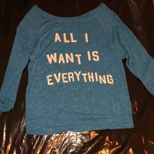 Blue and white long sleeved shirt